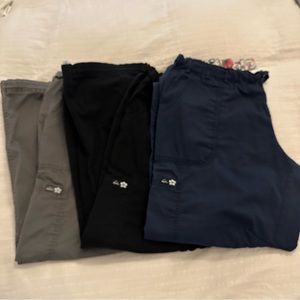 This listing is for a lot of 3 PAIRS of Koi brand scrub pants in PETITE XL